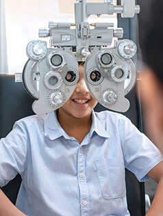 Boy having an eye exam at Bard Optical Peoria Shoppes at Grand Prairie